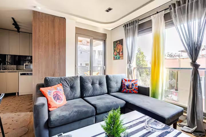 Diker Port Residence modern mutfak ve salon bağlantısı